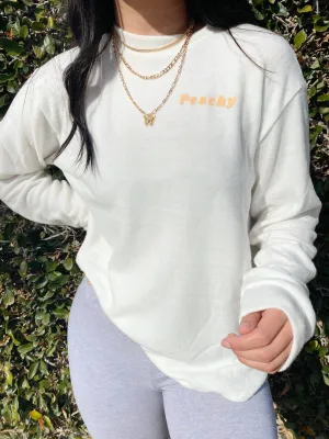 peachy sweater
